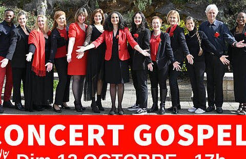 Photo du groupe, les chanteurs sont habillés en rouge & noir